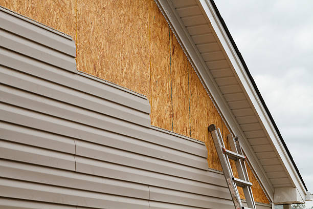 Professional Siding Contractor technician working in Marlborough, MA